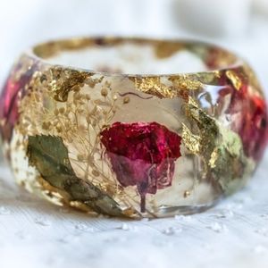 Handmade epoxy resin bangle with dried rose petals and gold flakes
